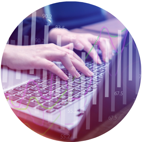 hands typing on laptop keyboard with market graphs overlayed